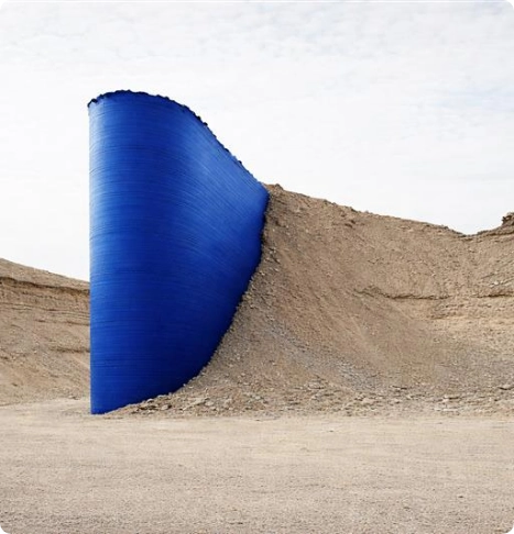 Abstract structure emerging from landscape representing employee experience transformation and performance improvement